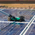 Can i use a garden hose to clean my solar panels?